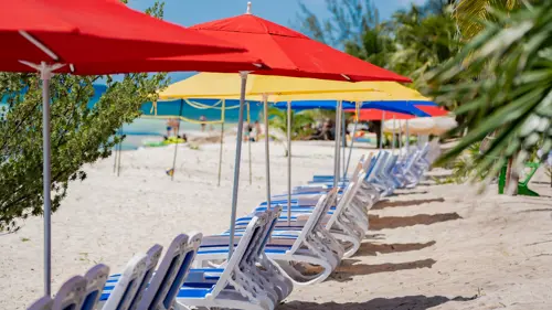 KUZA Deluxe Pass El Cielo Adventure Beaach Relaxing at KUZÁ deluxe beach access with lounge chairs
